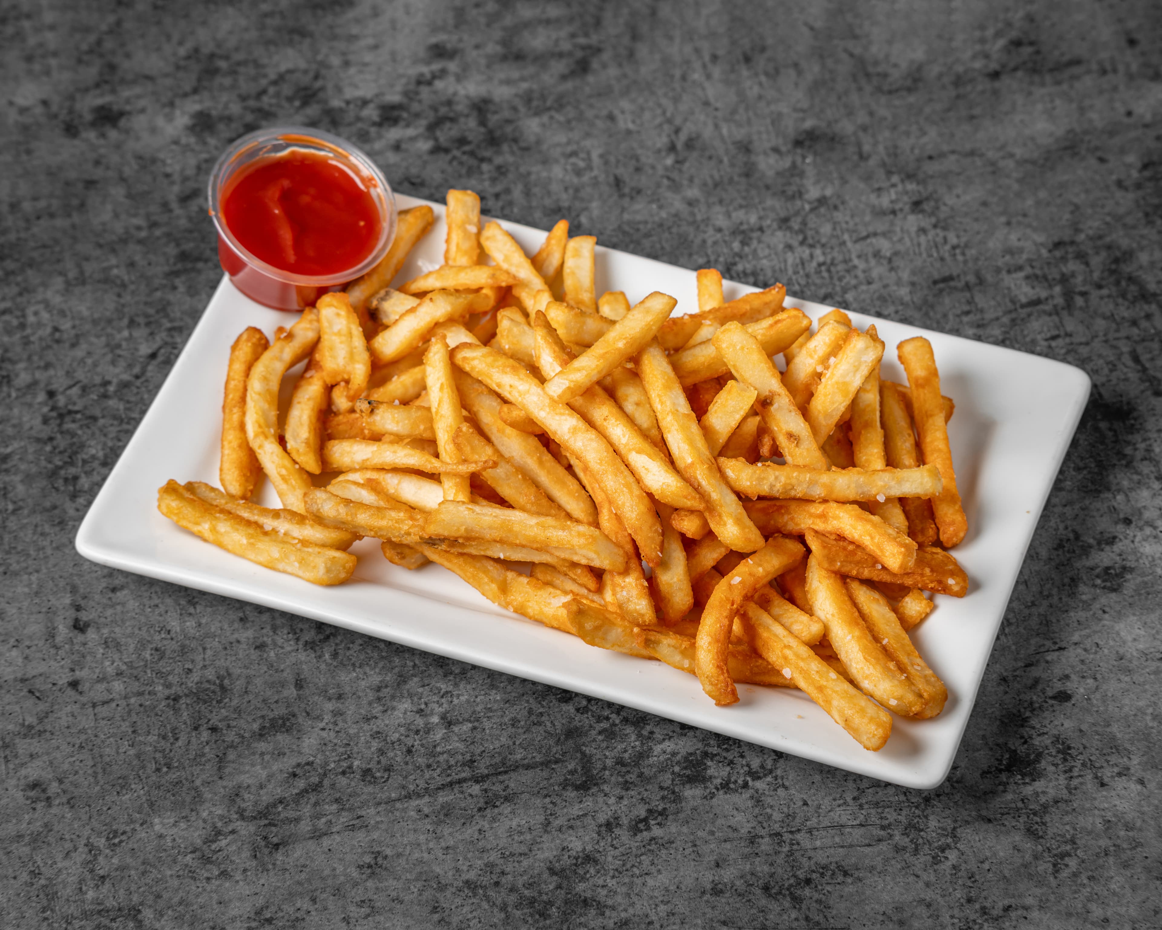 Basket of Fries - Crispy golden fries, seasoned salt at QuartHaus Chandler