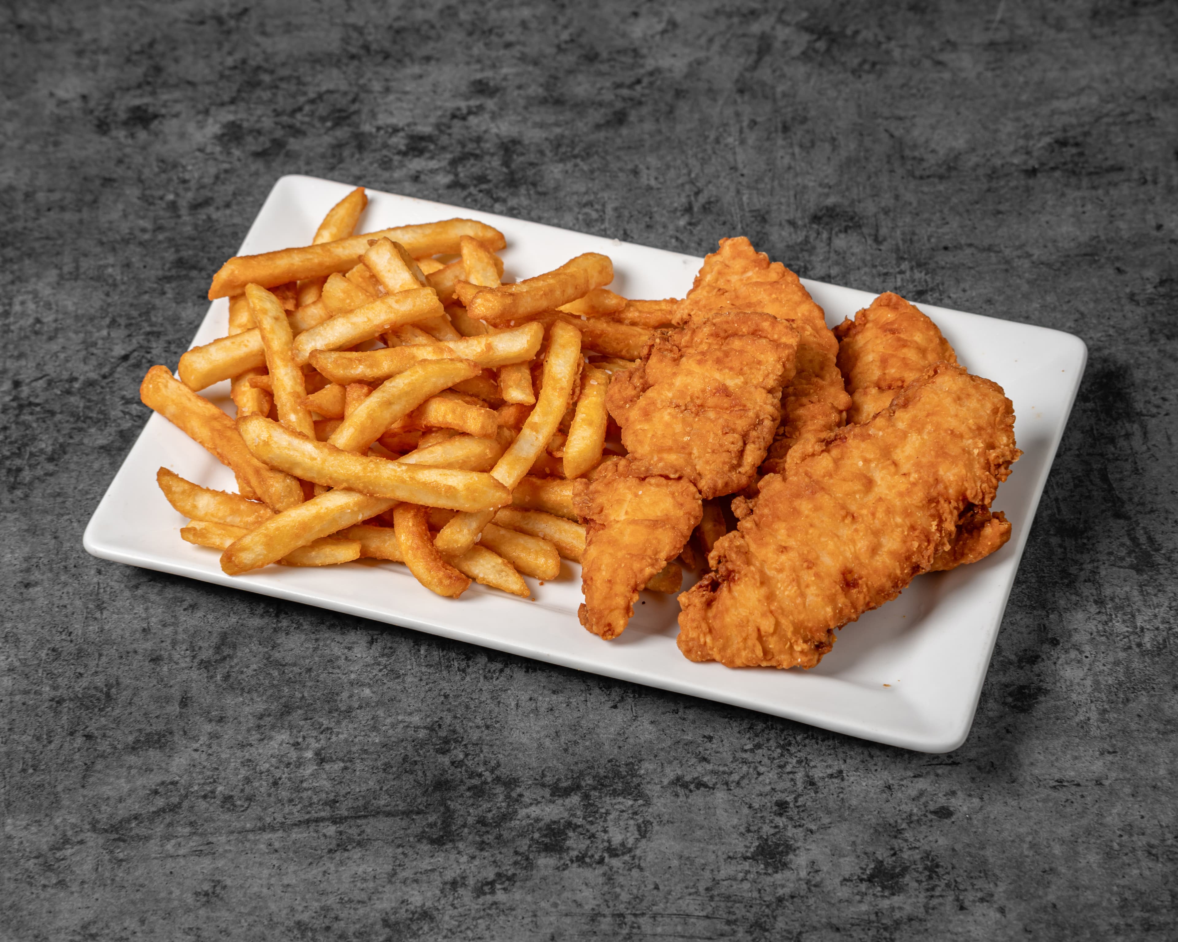 Chicken Tenders - Hand-breaded, served with fries at QuartHaus Chandler